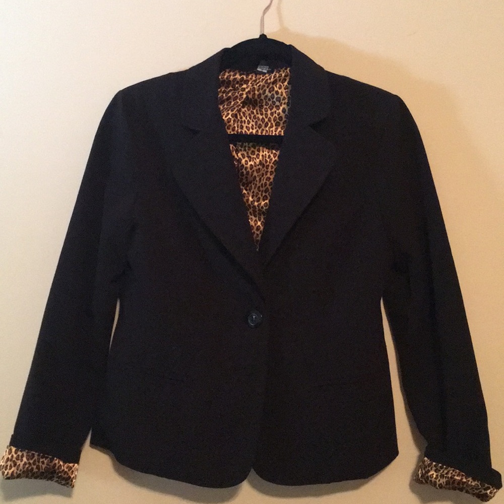 Black blazer with leopard lining.